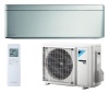 Инверторный кондиционер серебристого цвета  Daikin FTXA50BS/RXA50B